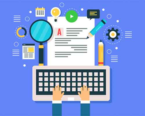 A computer keyboard with with multiple learning tools surrounding it.